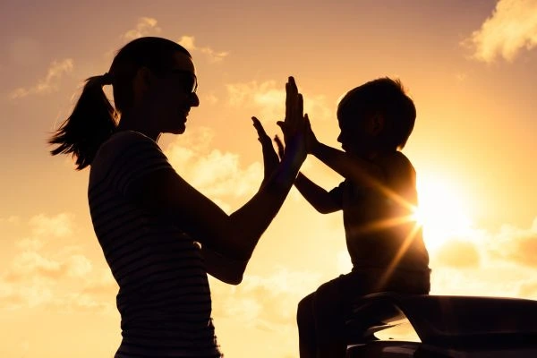 Image of happy mother and child after resolving child arrangements West Yorkshire